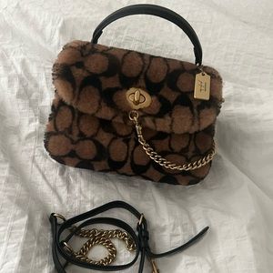 Coach X Jennifer Lopez brand new never worn. Has tags and dust bag as well.